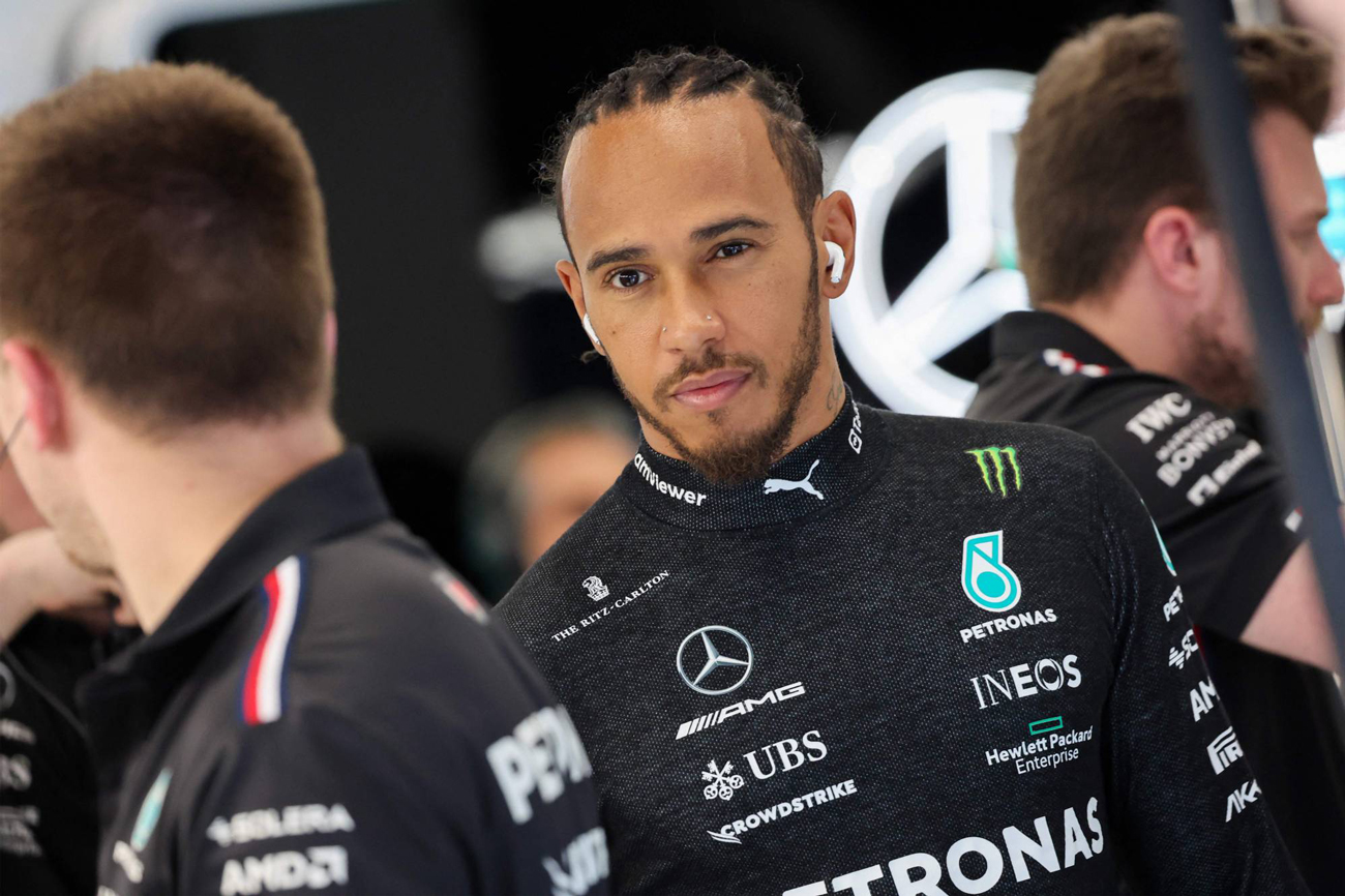 Lewis Hamilton prepares in the garage